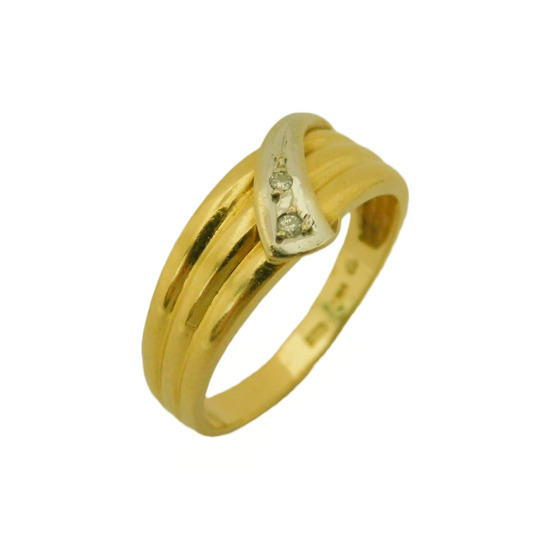 ANILLO TALLADO EN ORO BLANCO Y AMARILLO CON PIEDRAS BLANCAS