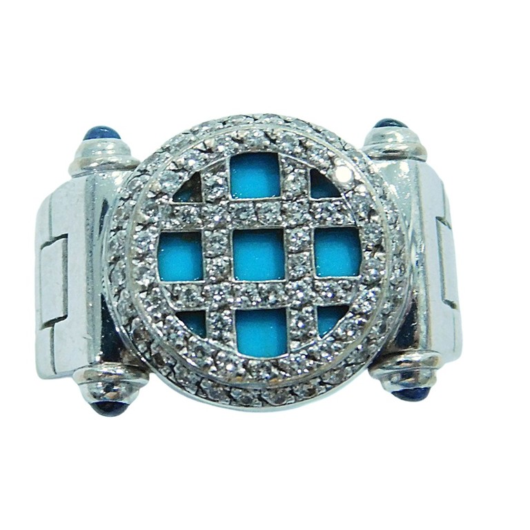 ANILLO ANCHO ORO BLANCO PIEDRA AZUL CENTRAL Y MINI CIRCONITAS