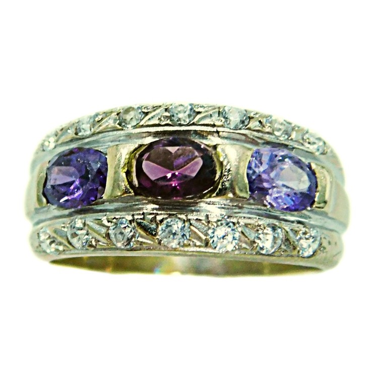 ANILLO ORO BLANCO PIEDRAS MORADAS Y BLANCAS